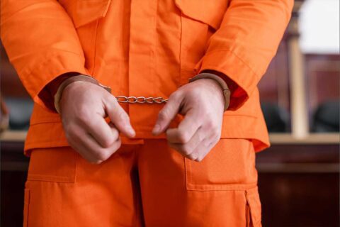 Inmate with Handcuffs on Needing Bail Bonds in West University Place, Texas