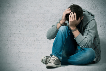 Distressed young man needing a bail bondsman in Midtown