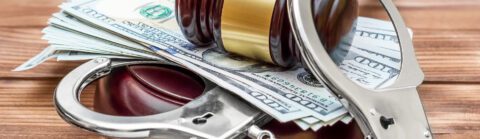 Gavel, handcuffs and cash for bail bond loans in Sharpstown