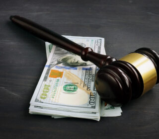 Gavel and cash for cheap bail bonds in Riverview