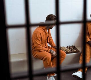 Inmate in a jail cell waiting for a bail bond in Fort Bend County