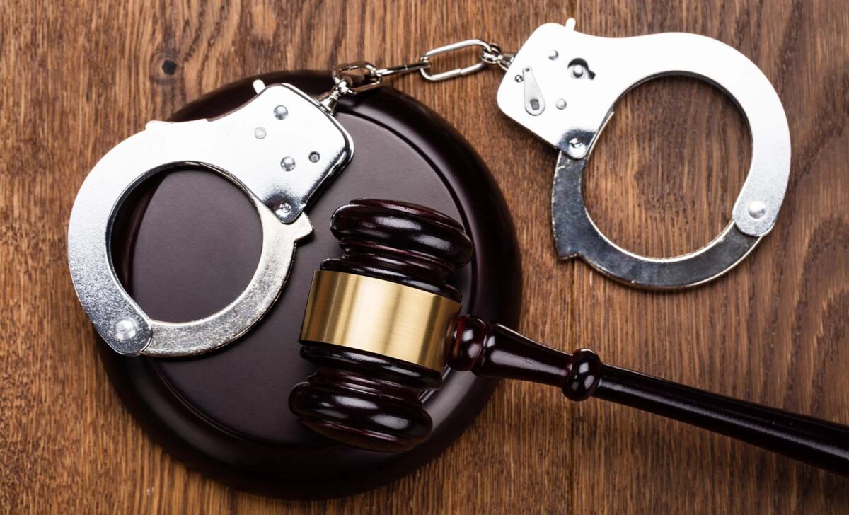 Handcuffs and gavel for trusted local bail bonds in Cypress